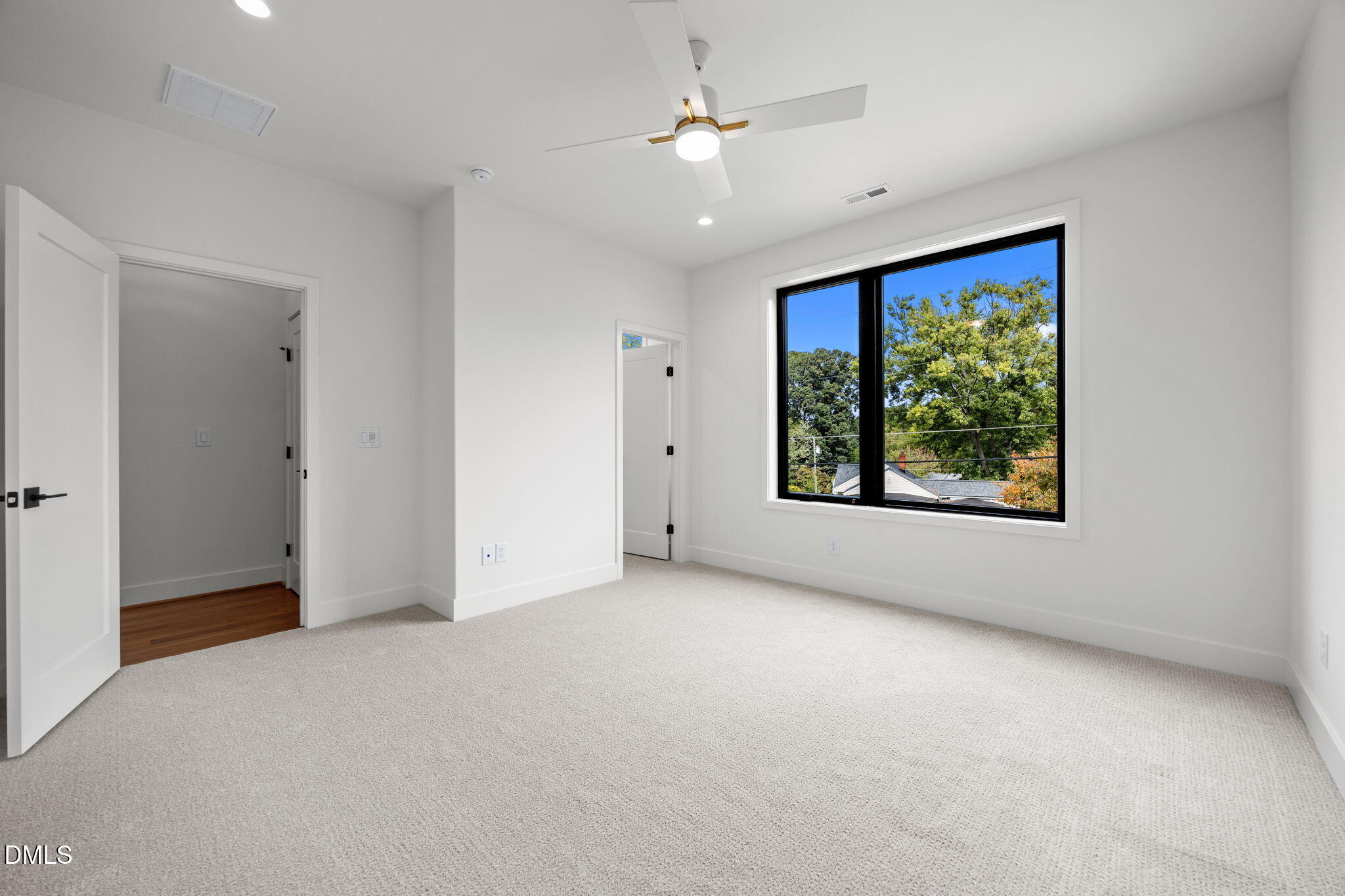 406 Columbia Drive Raleigh, NC 27604 - Photo 42 of 47 a view of an empty room with a window