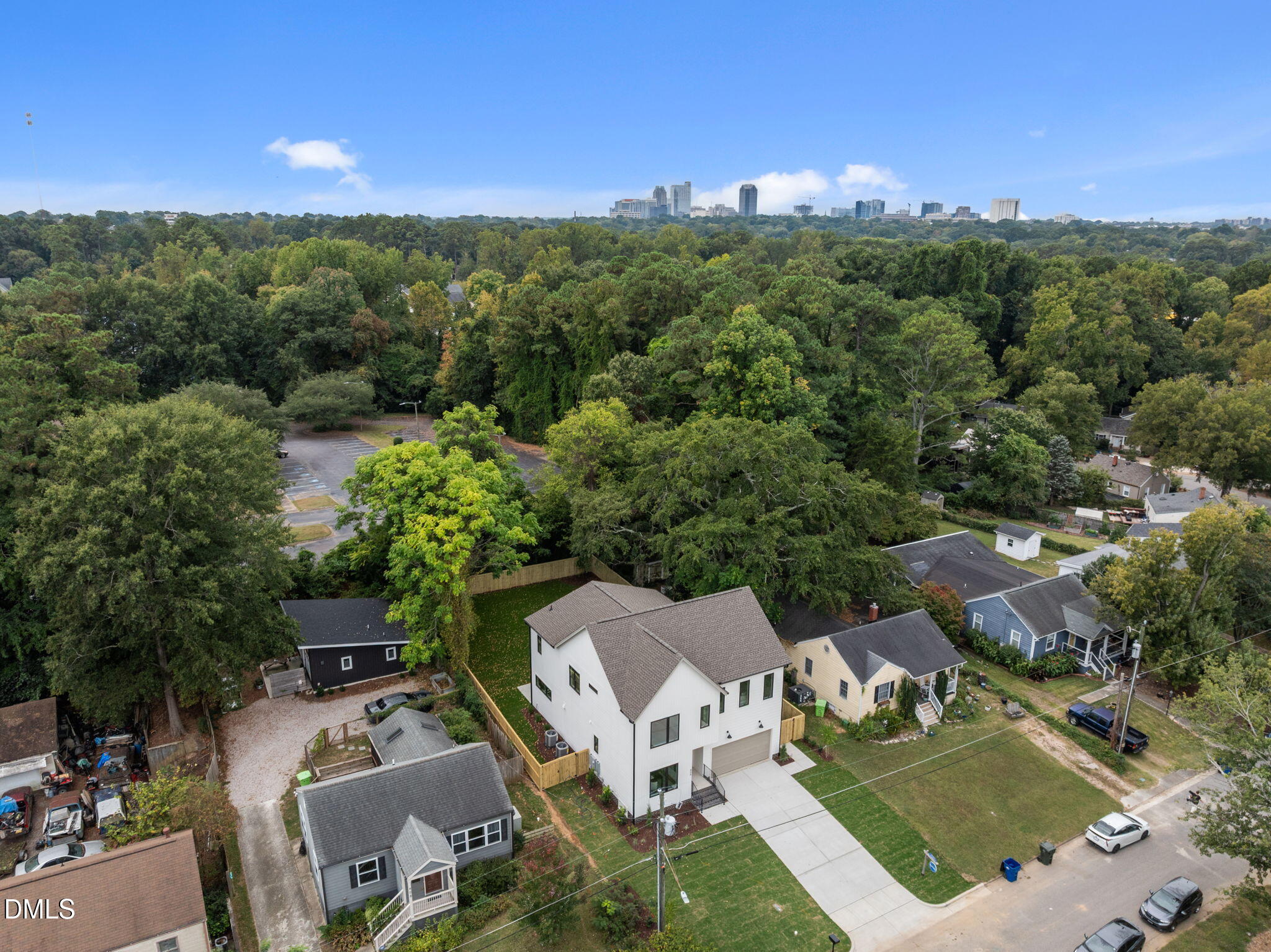 406 Columbia Drive Raleigh, NC 27604 - Photo 44 of 47 an aerial view of a house with a yard