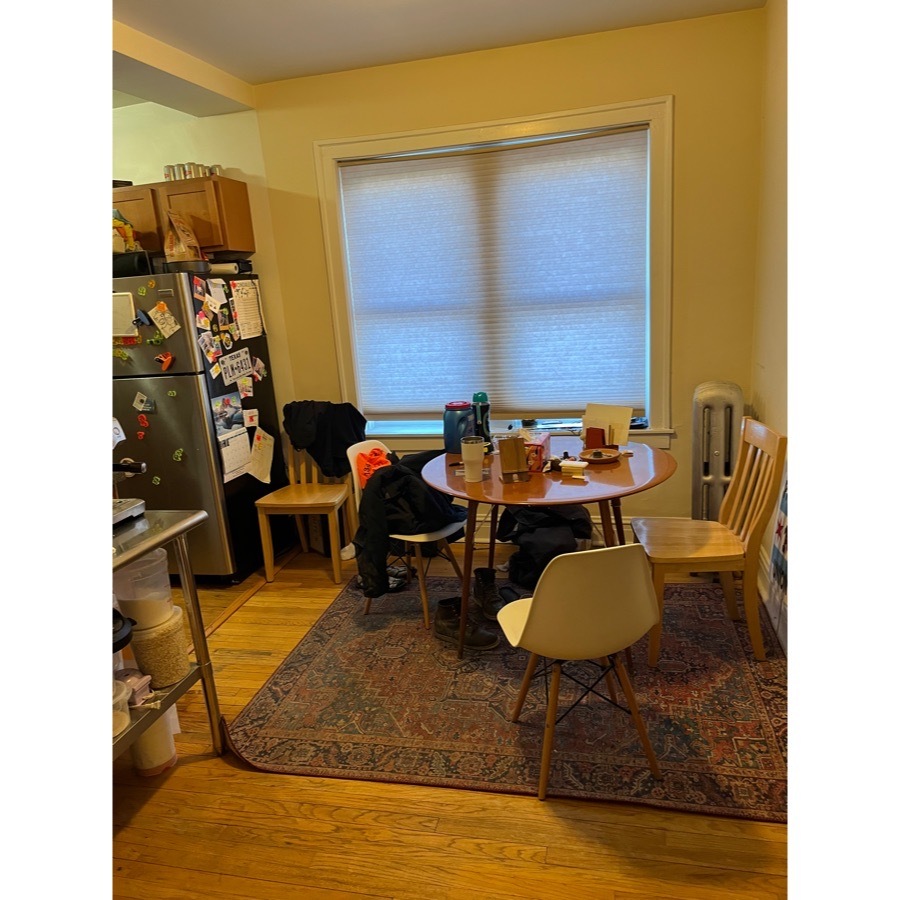 3808 West Irving Park Road, Unit 11 Chicago, IL 60618 - Photo 4 of 9 a room with furniture and a window