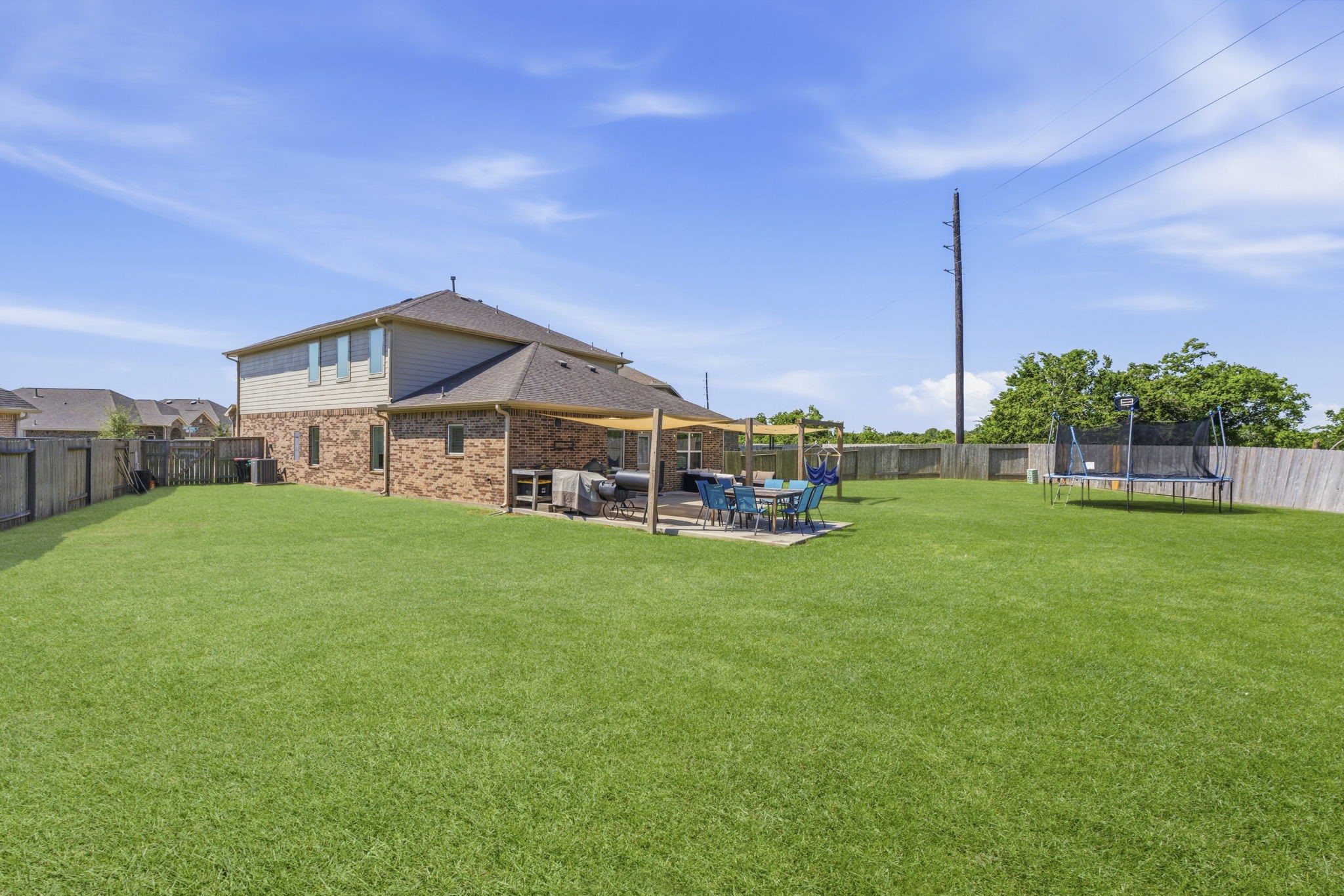 2401 Abbot Brk Drive Rosharon, TX 77583 - Photo 41 of 50 The home is equipped with front and back gutters, making rainwater management a breeze and keeping the exterior well-maintained.
