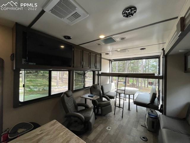 34135 Berndt Road Yoder, CO 80864 - Photo 10 of 24 a living room with furniture and a large window