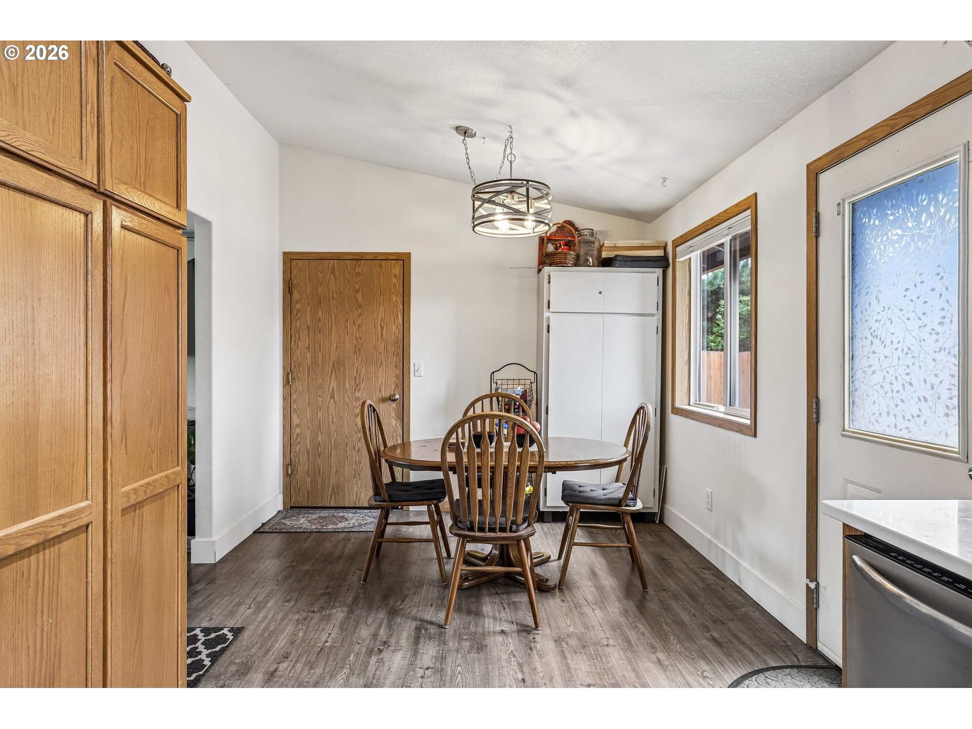 608 Southeast Sumner Street Camas, WA 98607 - Photo 9 of 39 a dining room with furniture and window