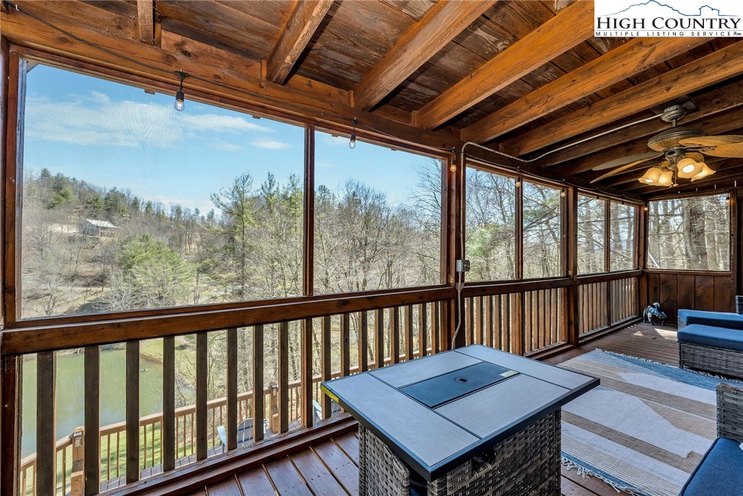 251 Stone Valley Road Grassy Creek, NC 28631 - Photo 17 of 46 a view of a balcony with furniture