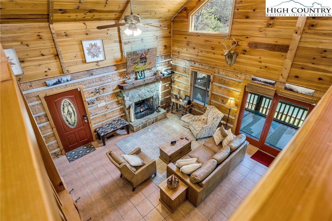 251 Stone Valley Road Grassy Creek, NC 28631 - Photo 25 of 46 a view of a patio with wooden floor