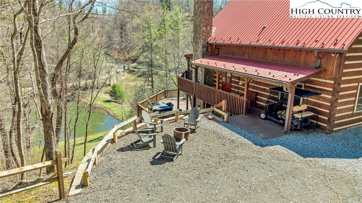 251 Stone Valley Road Grassy Creek, NC 28631 - Photo 4 of 46 a view of a balcony with chairs