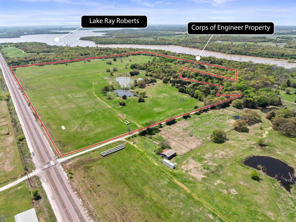 2 Hog Town Road Collinsville, TX 76233 - Photo 3 of 10 a view of a back yard of the green space