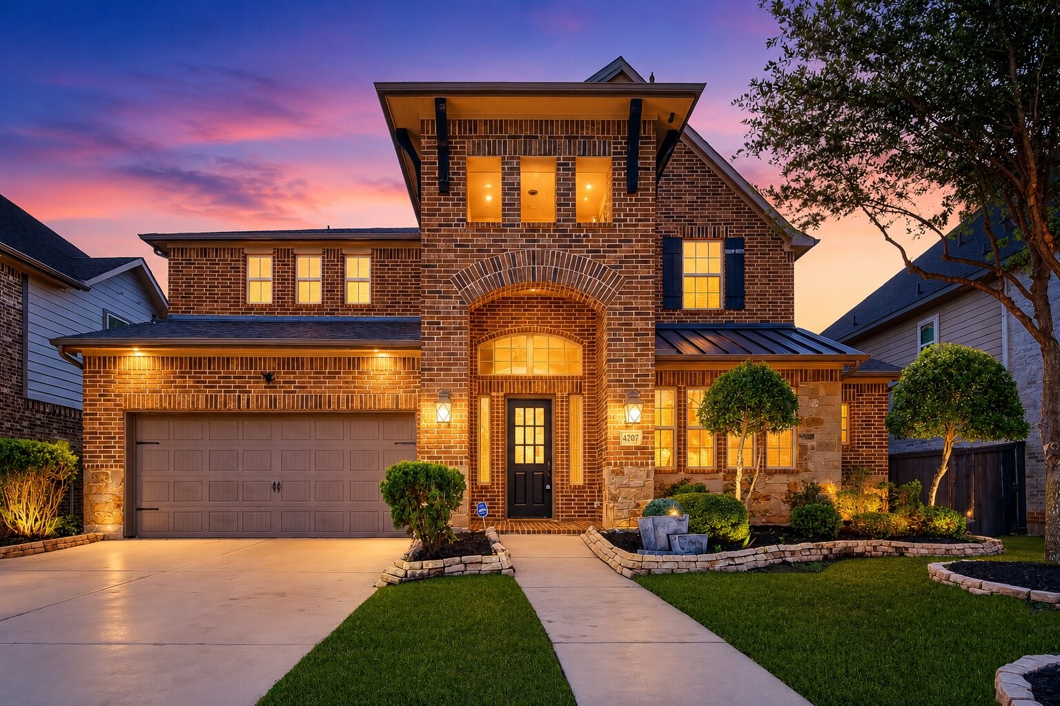 4207 Reagan Ridge Court Richmond, TX 77406 - Photo 2 of 50 Beautiful Westin home in the heart of Harvest Green with brick-and-stone curb appeal.