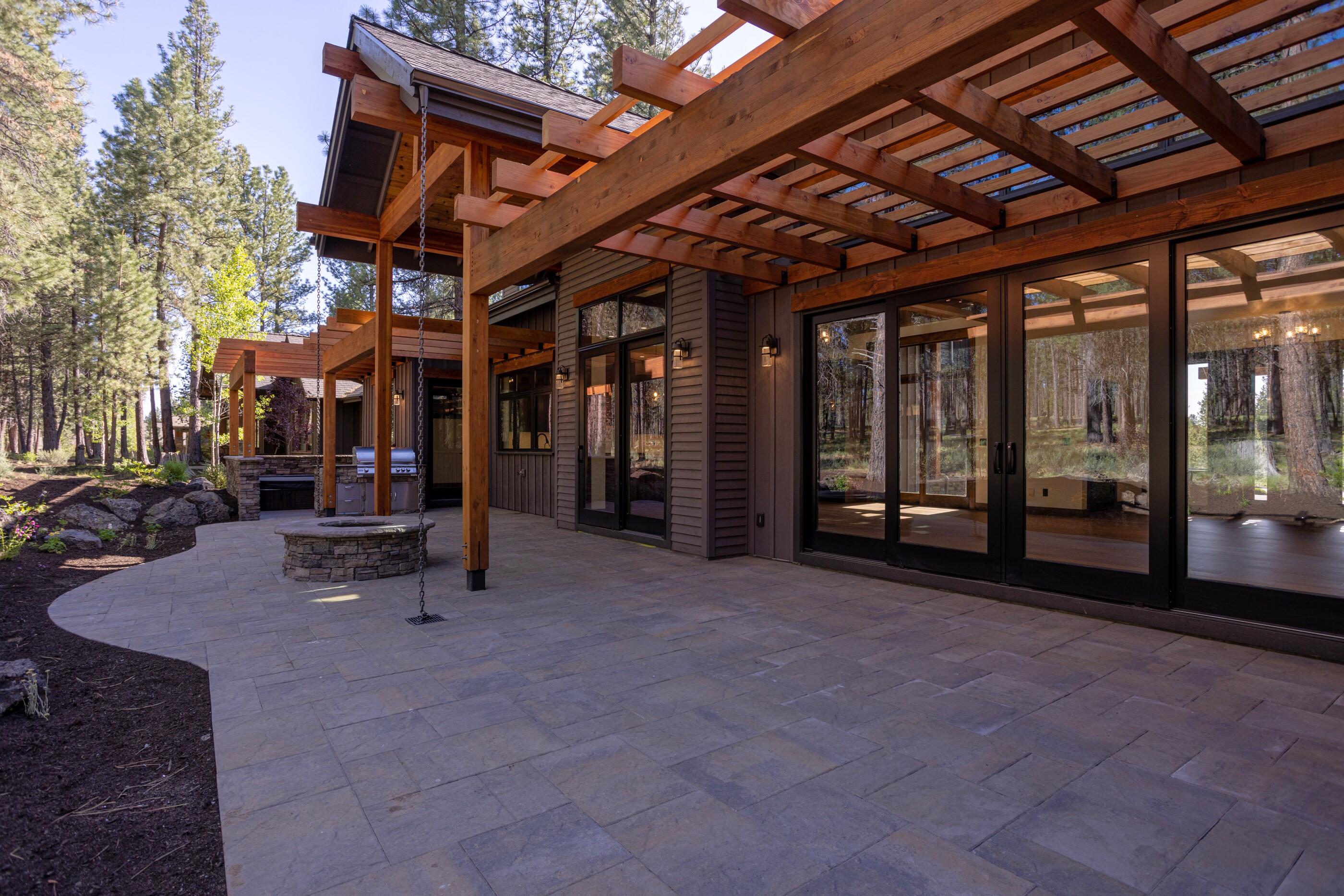 56593 Sunstone Loop, Unit 127 Bend, OR 97707 - Photo 30 of 46 Back Paver Patio, Fire Pit