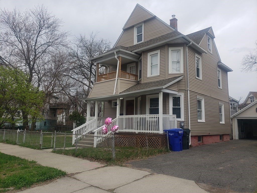 19 Wareham Street Springfield, MA 01108 - Photo 1 of 25 a front view of a house with garden