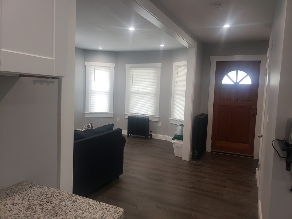19 Wareham Street Springfield, MA 01108 - Photo 23 of 25 a living room with furniture and a wooden floor