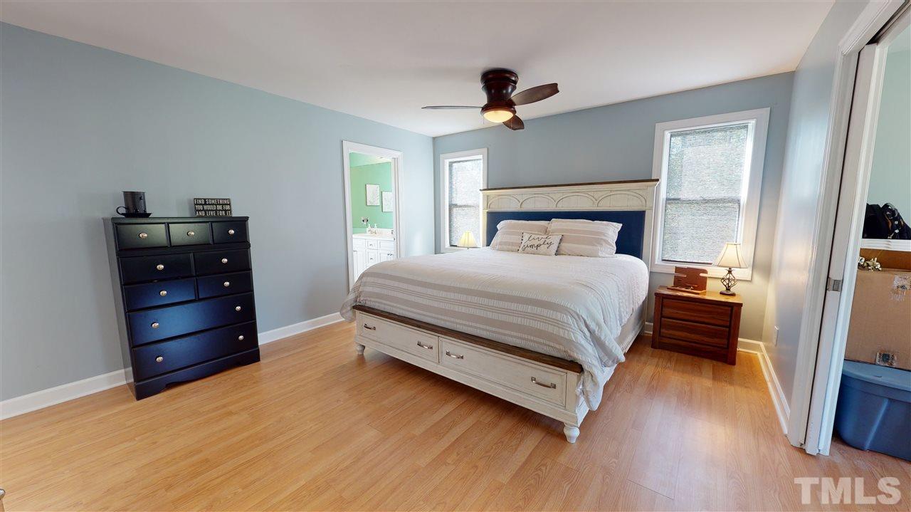 6558 Todd Road Bailey, NC 27807 - Photo 16 of 23 a bedroom with a bed and a dresser