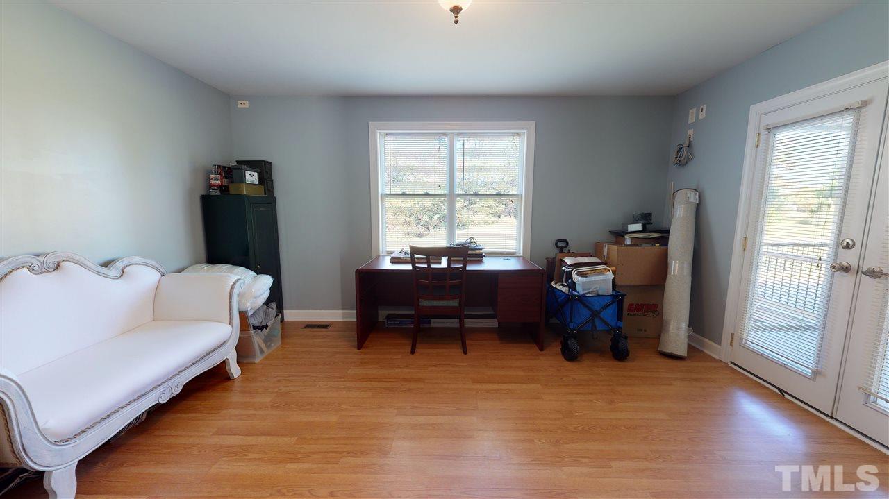 6558 Todd Road Bailey, NC 27807 - Photo 19 of 23 a living room with furniture and a window