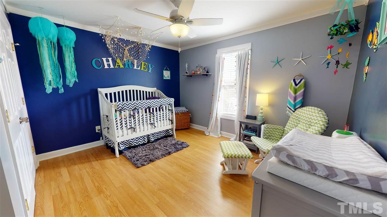 6558 Todd Road Bailey, NC 27807 - Photo 20 of 23 a bedroom with a bed and a window