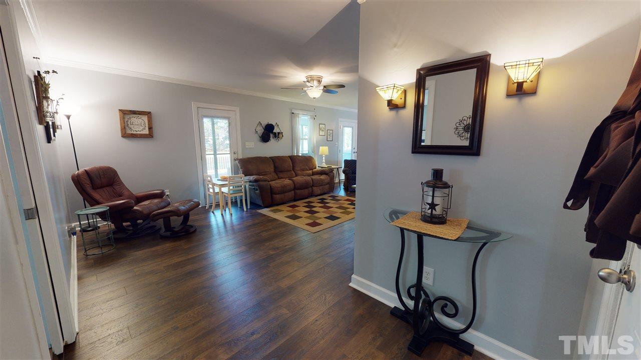 6558 Todd Road Bailey, NC 27807 - Photo 3 of 23 a living room with furniture and a wooden floor
