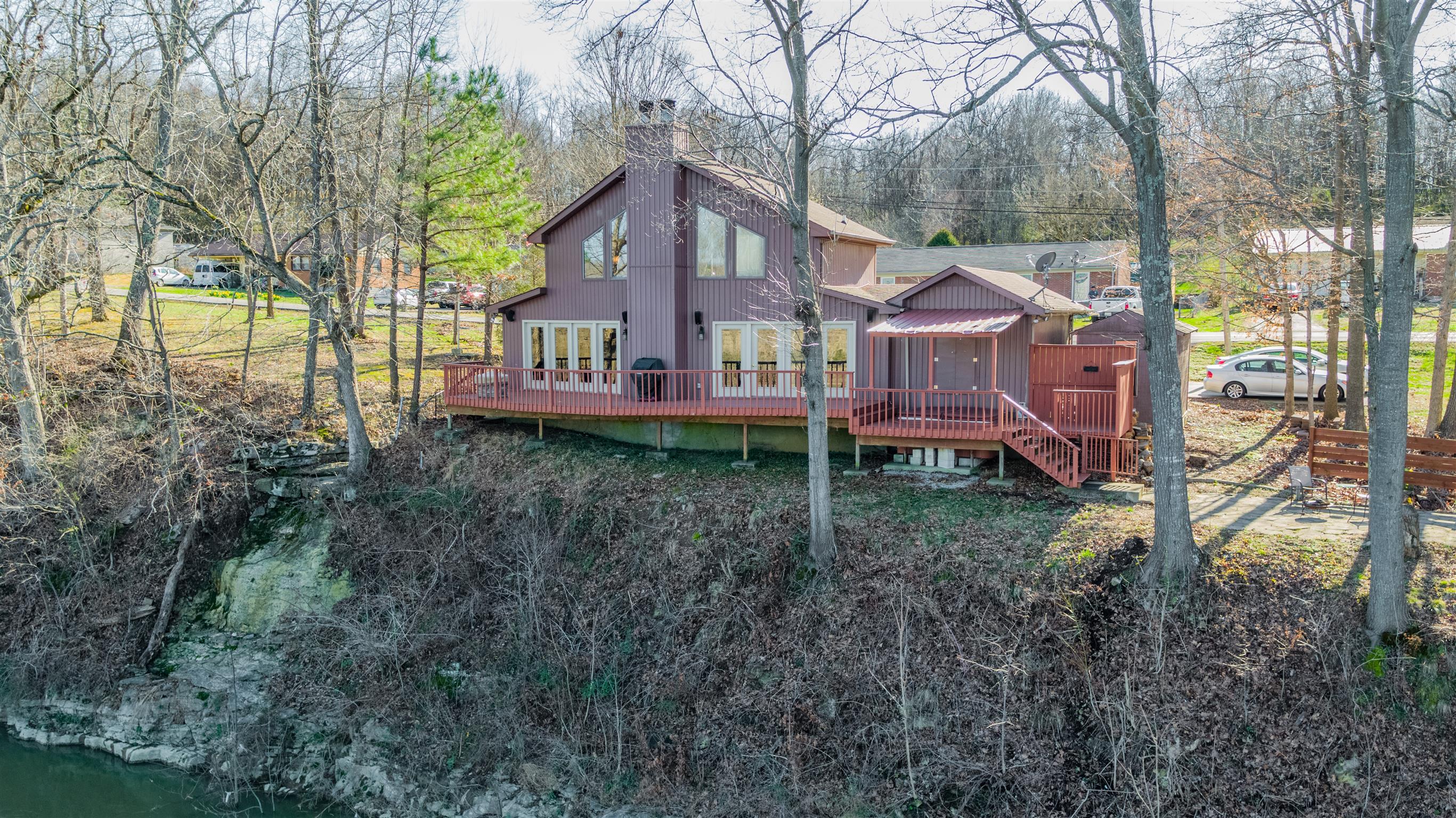 291 Mayhew Road Clarksville, TN 37040 - Photo 1 of 30 a view of a house with a yard and large trees