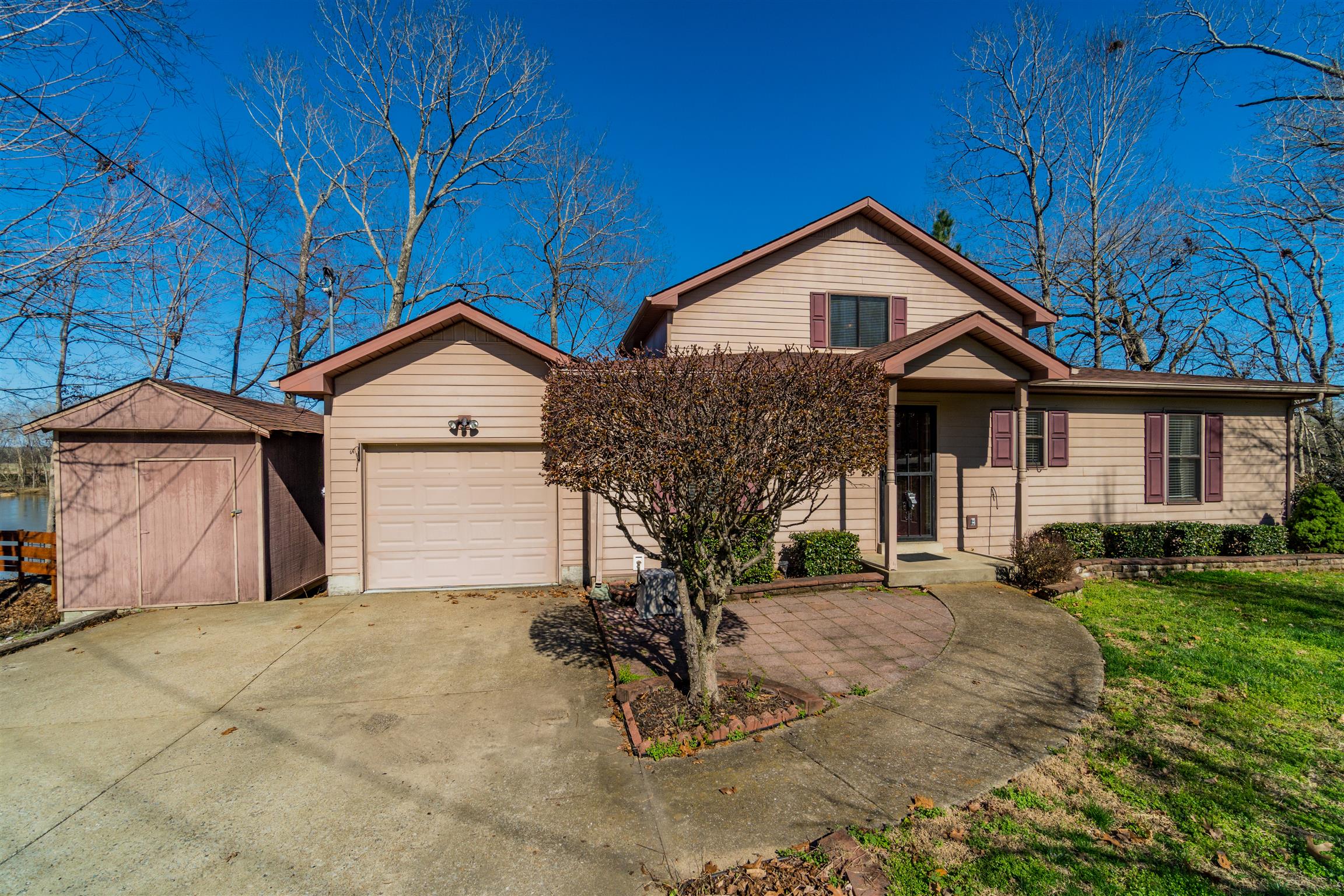 291 Mayhew Road Clarksville, TN 37040 - Photo 25 of 30 a view of a house with a yard