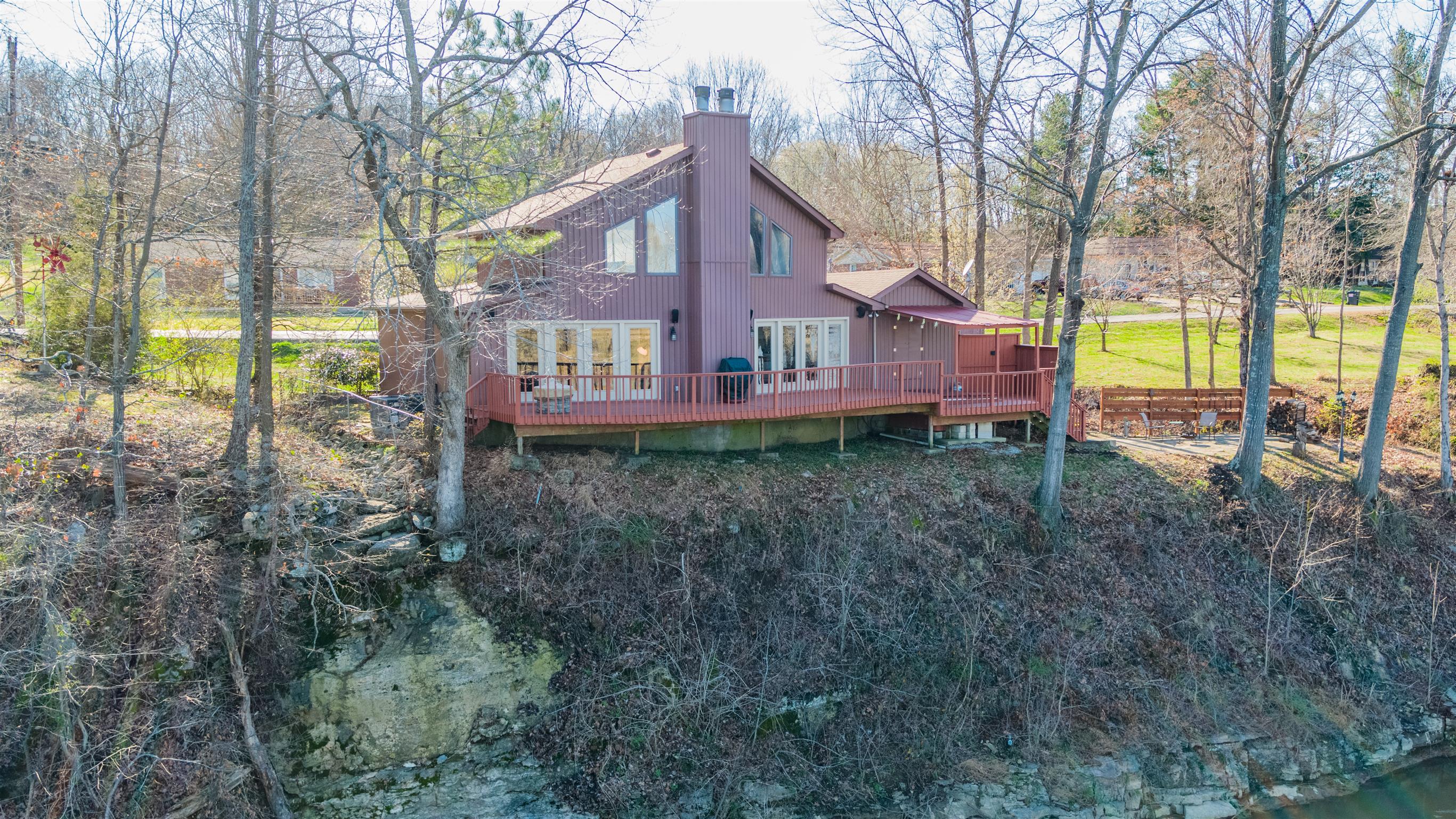 291 Mayhew Road Clarksville, TN 37040 - Photo 5 of 30 a view of a house with a yard and sitting area