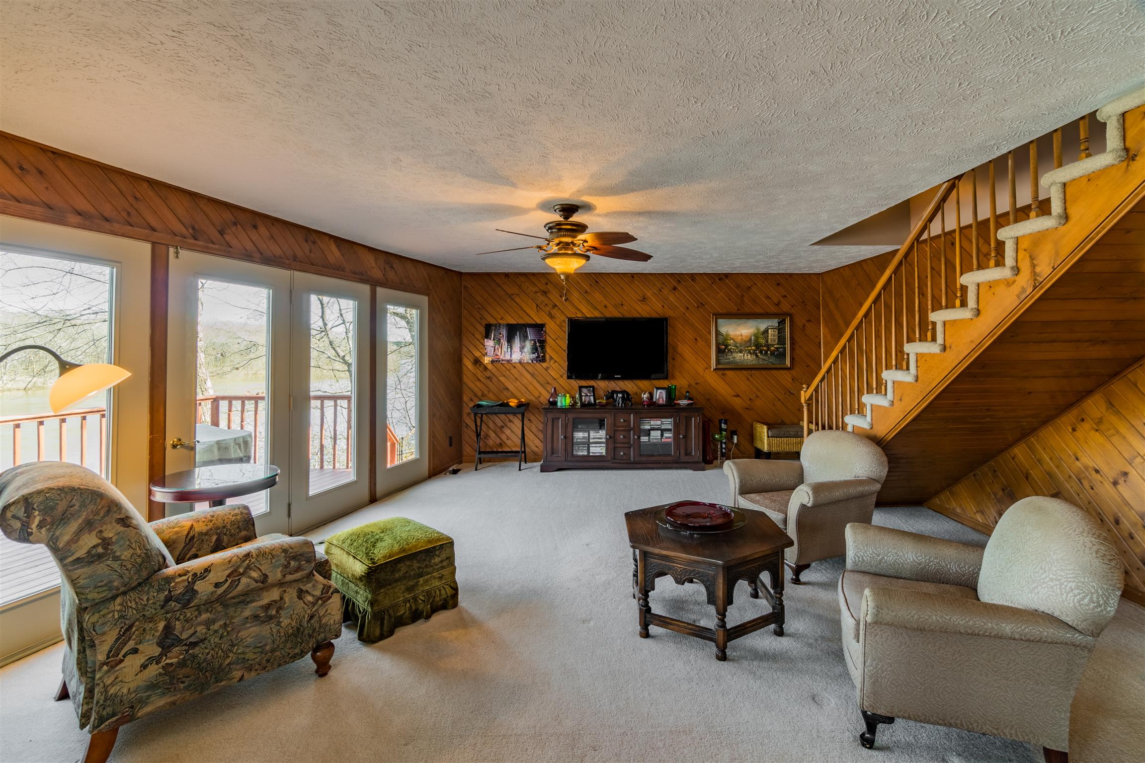 291 Mayhew Road Clarksville, TN 37040 - Photo 10 of 30 a living room with furniture and a flat screen tv