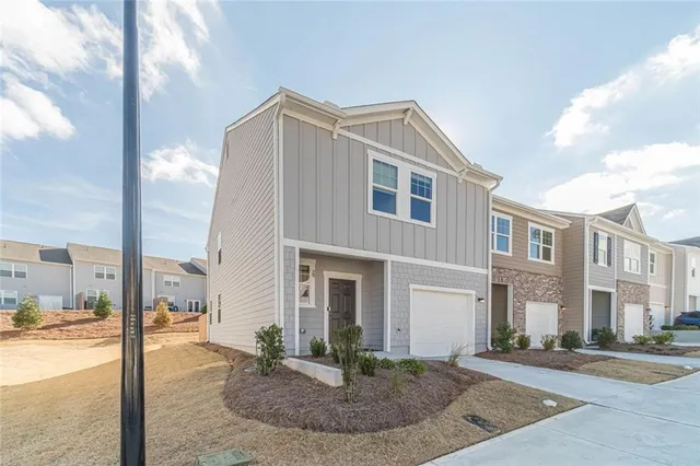 a front view of a building with street view