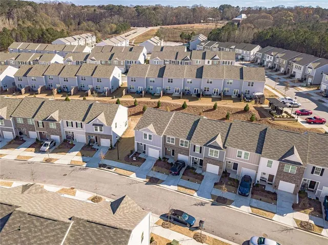 an aerial view of a house with a garden
