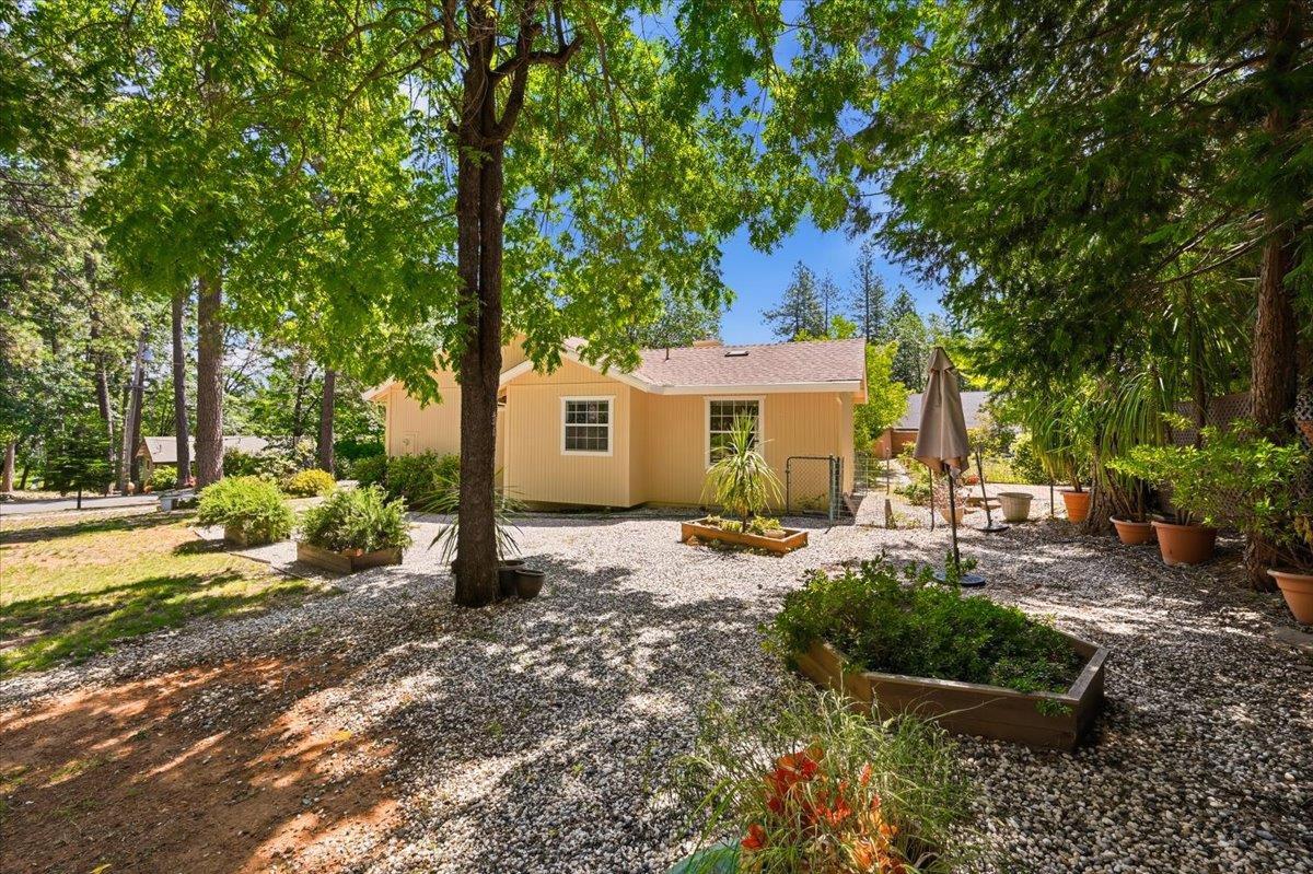 12600 Friar Tuck Road Grass Valley, CA 95949 - Photo 31 of 56 a view of a house with backyard and sitting area