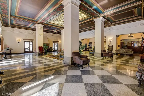 a view of a lobby with a rug