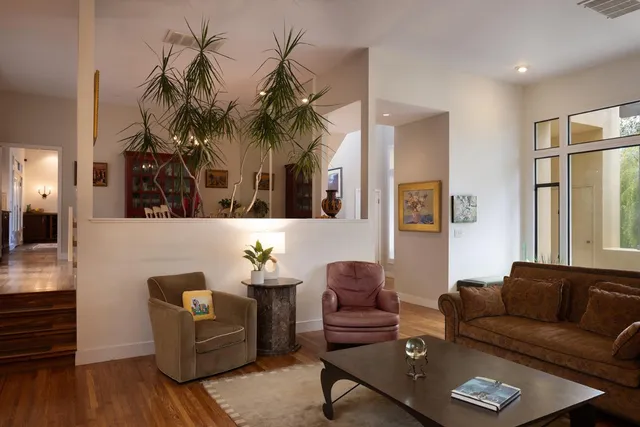 a view of a dining room with furniture window and outside view
