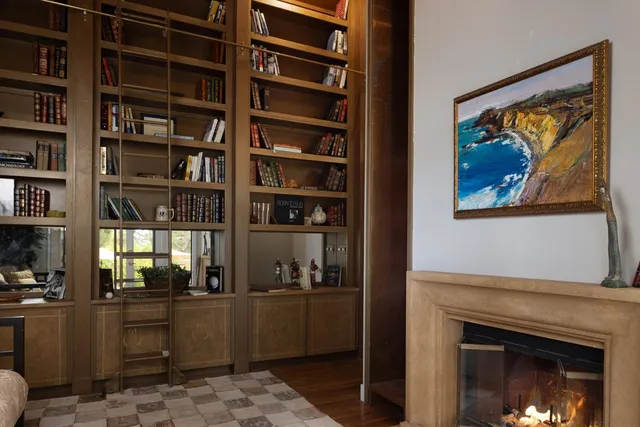 a kitchen with stainless steel appliances granite countertop a refrigerator a sink and a stove