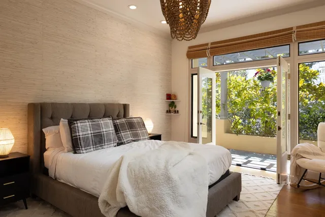 a bathroom with a double vanity sink mirror and shower