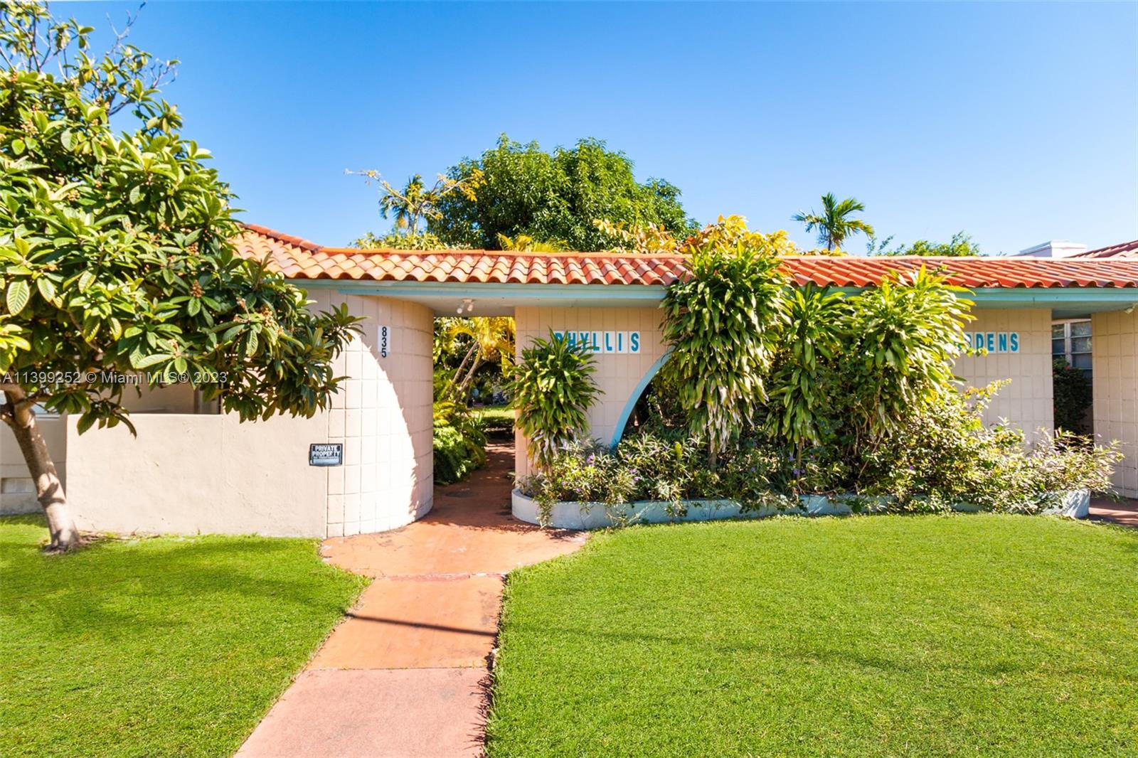 835 Alton Road, Unit 18 Miami Beach, FL 33139 - Photo 1 of 13 a view of a house with a yard