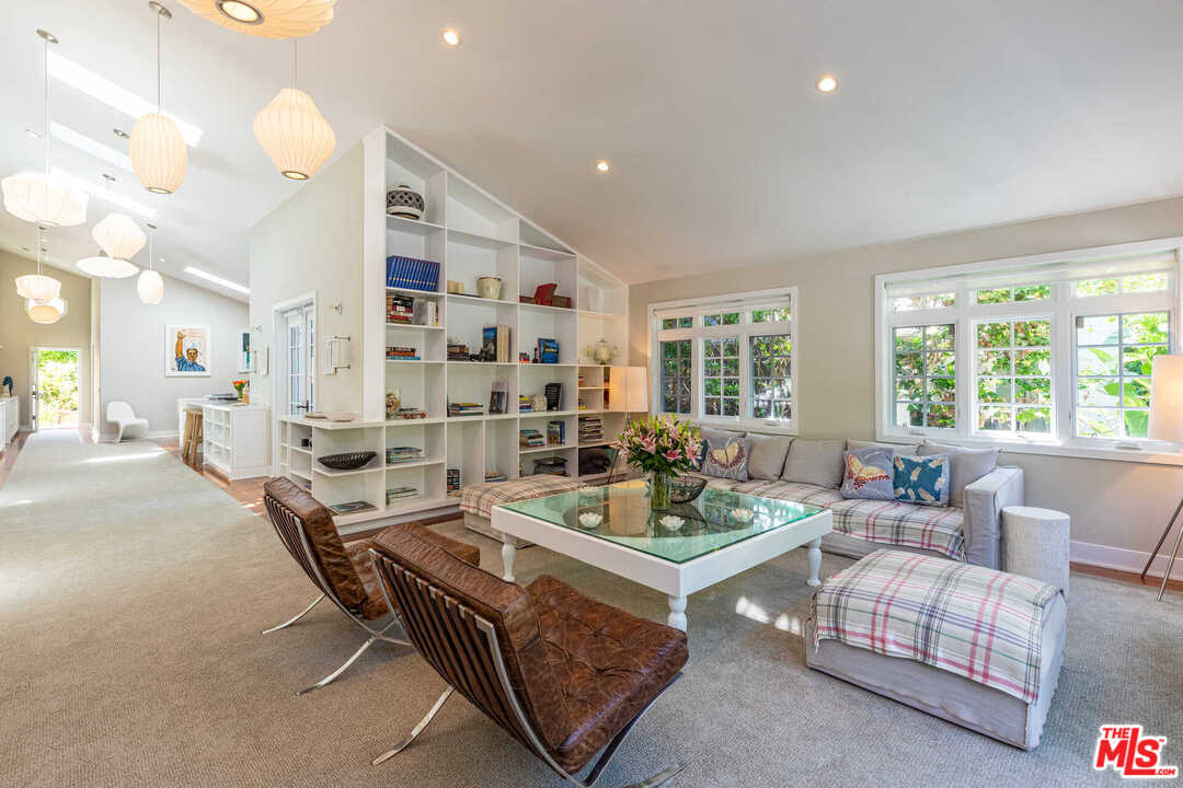 374 East Rustic Road Santa Monica, CA 90402 - Photo 5 of 21 a living room with furniture and a large window