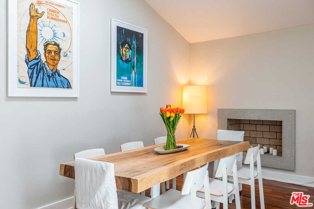 374 East Rustic Road Santa Monica, CA 90402 - Photo 9 of 21 a view of a dining room with furniture and wooden floor
