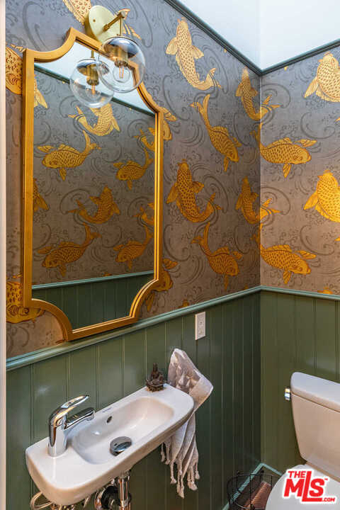 374 East Rustic Road Santa Monica, CA 90402 - Photo 10 of 21 a bathroom with a sink toilet and shower