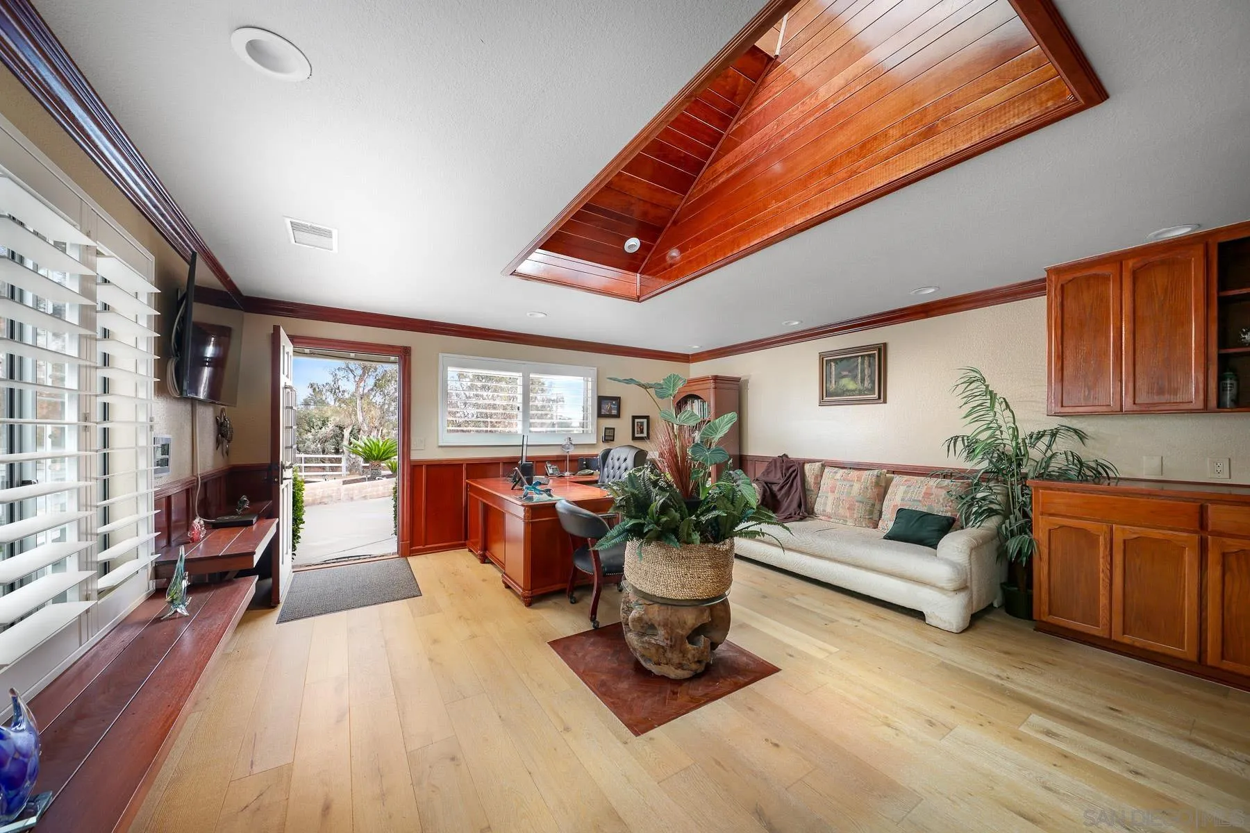 13764 McNally Road Valley Center, CA 92082 - Photo 12 of 26 a living room with furniture and wooden floor