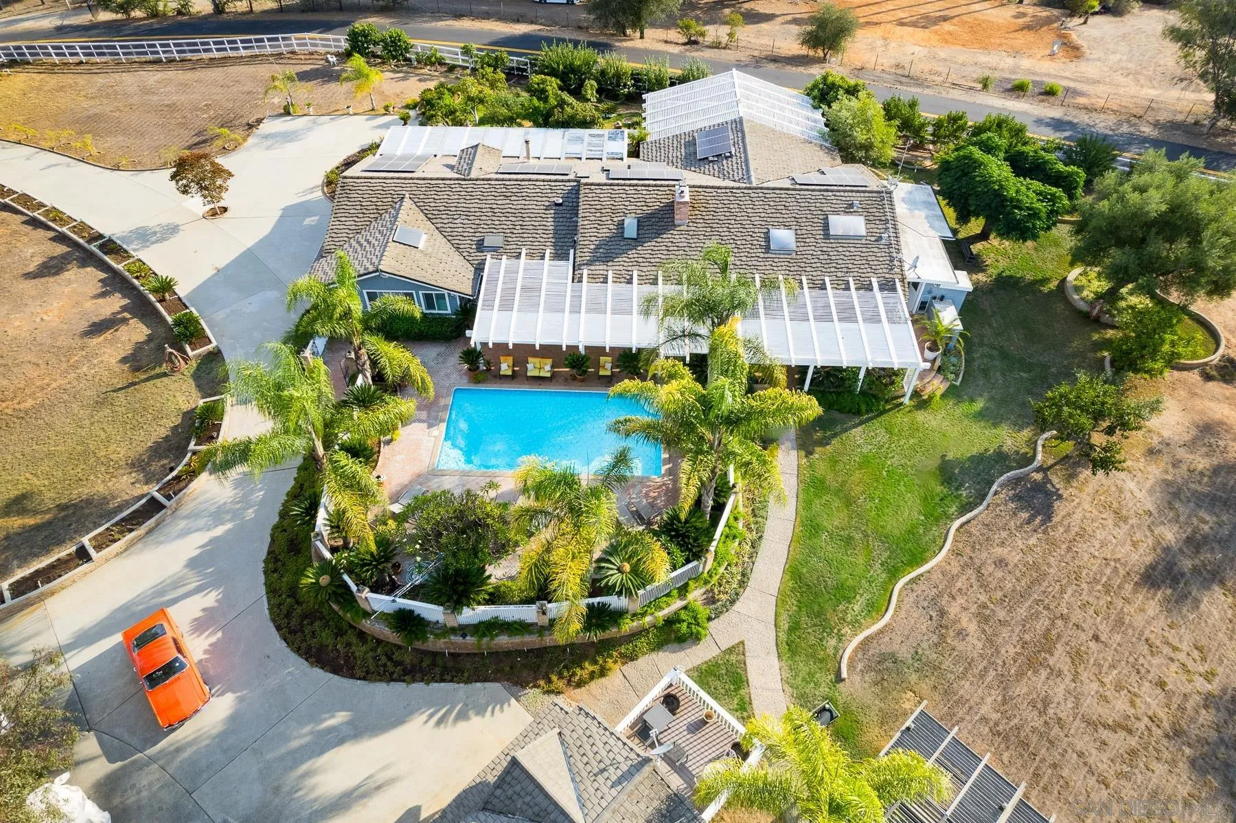 13764 McNally Road Valley Center, CA 92082 - Photo 25 of 26 a view of a house with a swimming pool