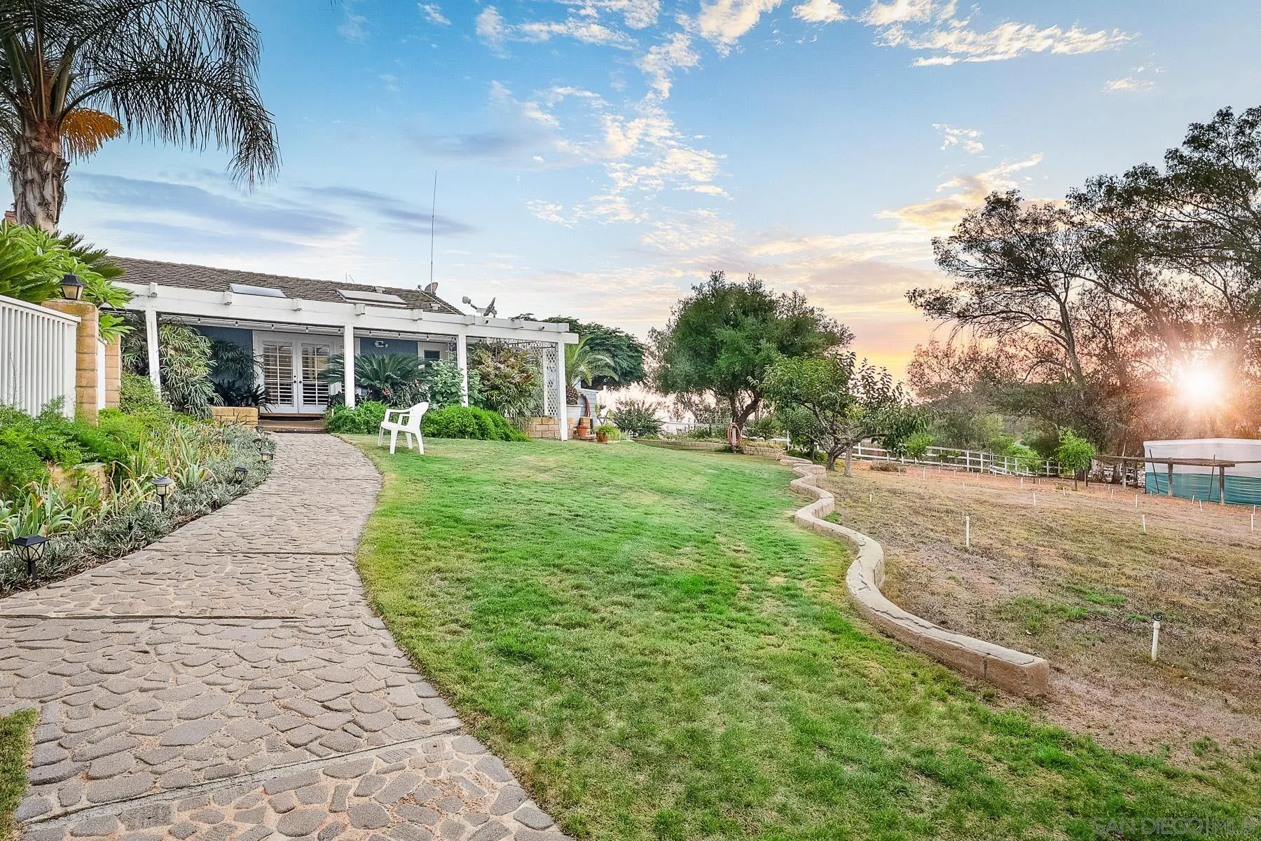 13764 McNally Road Valley Center, CA 92082 - Photo 26 of 26 a view of a yard with plants and trees
