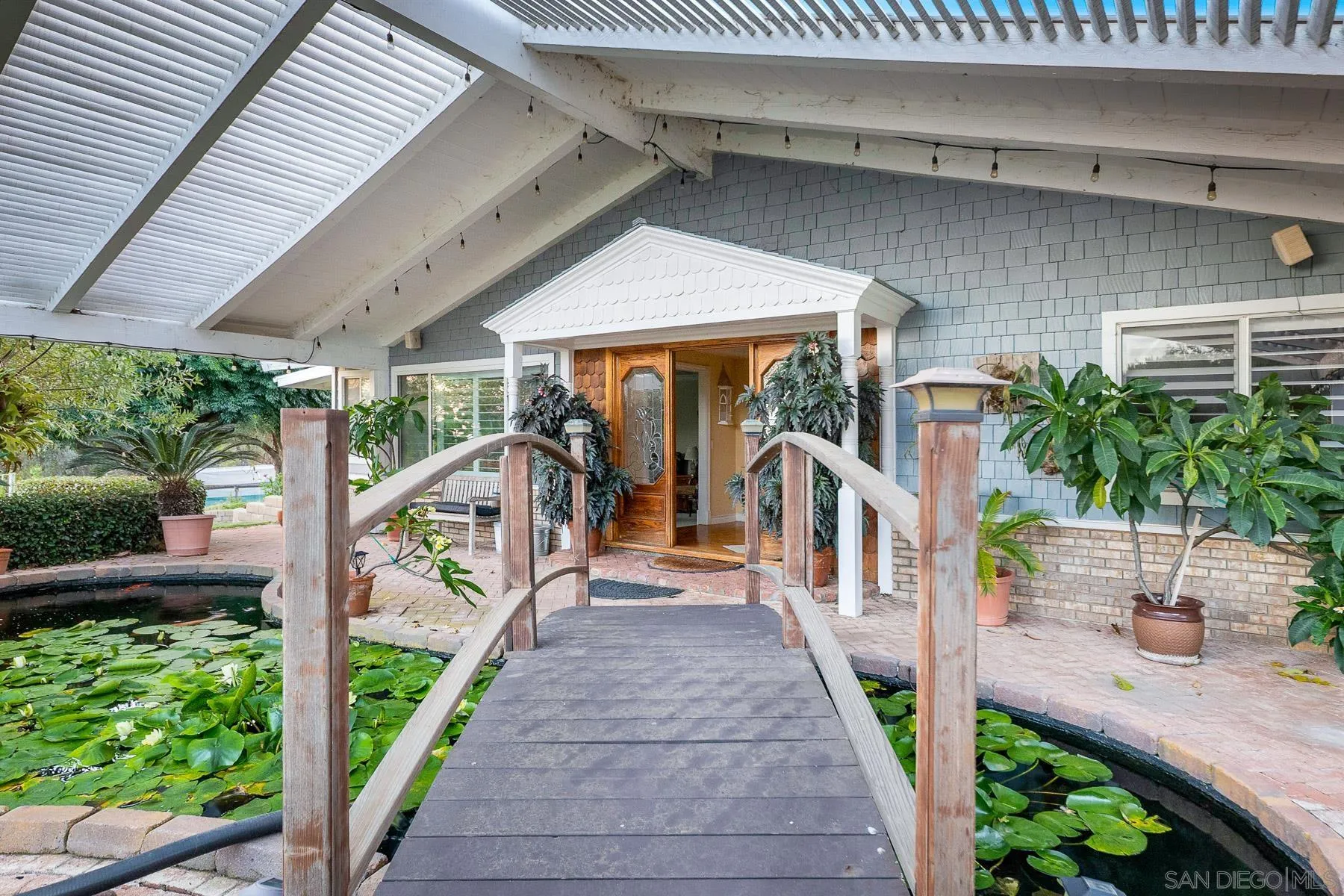 13764 McNally Road Valley Center, CA 92082 - Photo 4 of 26 a narrow alley leading to a building