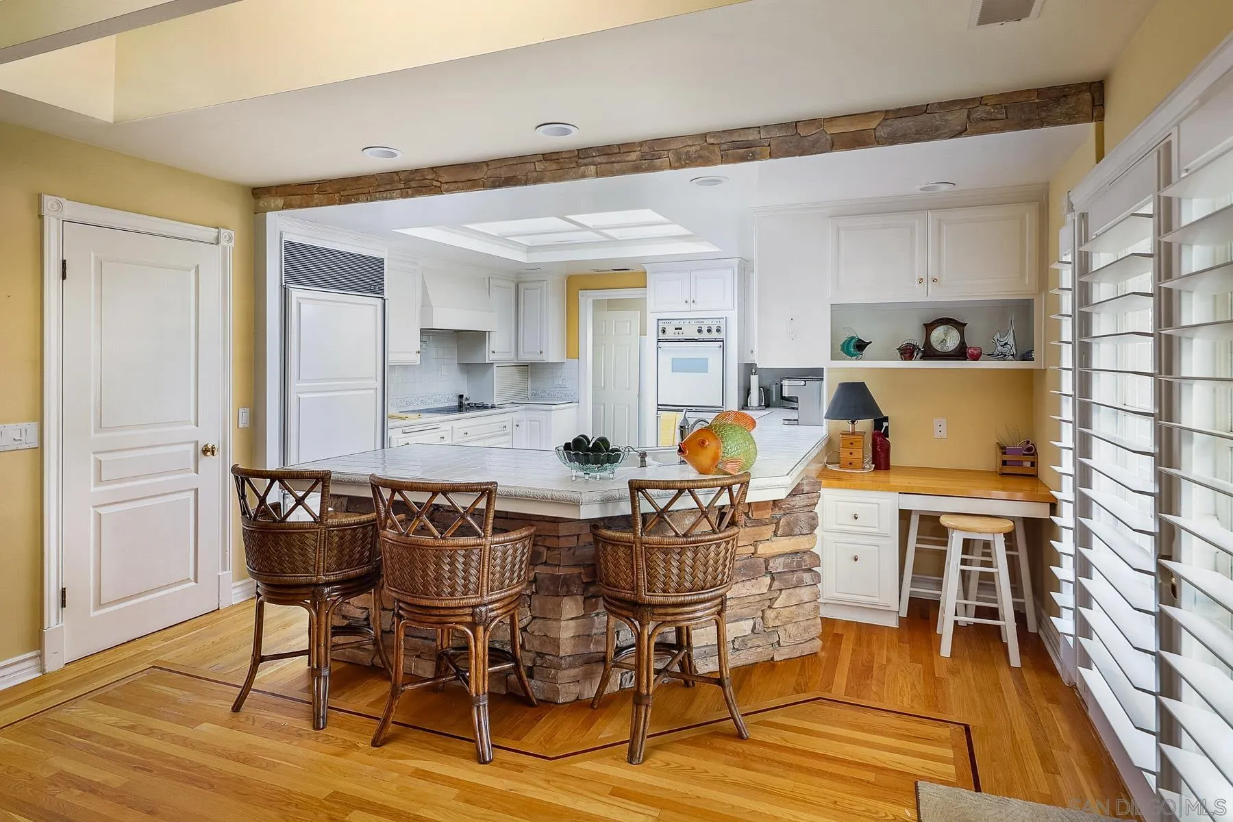 13764 McNally Road Valley Center, CA 92082 - Photo 5 of 26 a view of a dining room with furniture and wooden floor