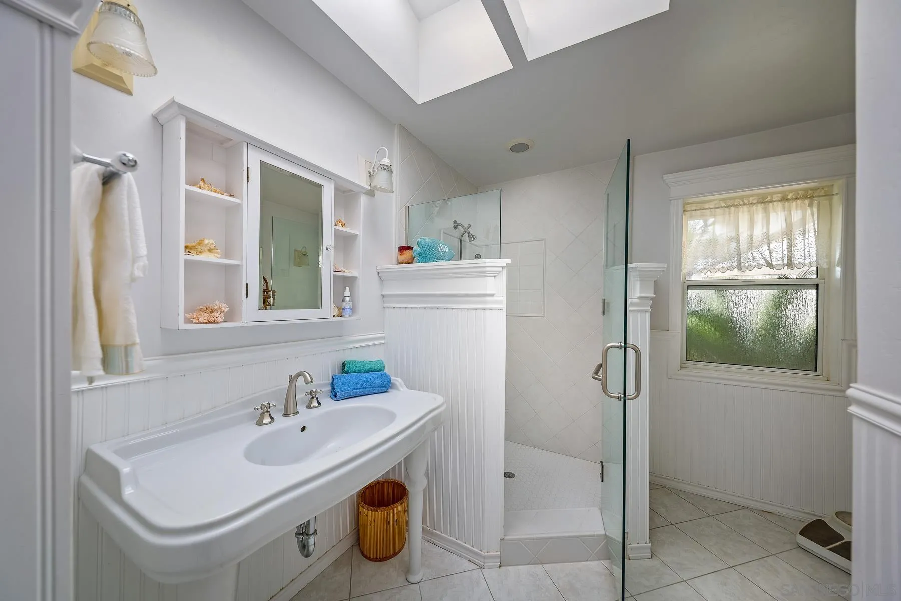 13764 McNally Road Valley Center, CA 92082 - Photo 9 of 26 a bathroom with a sink toilet and shower