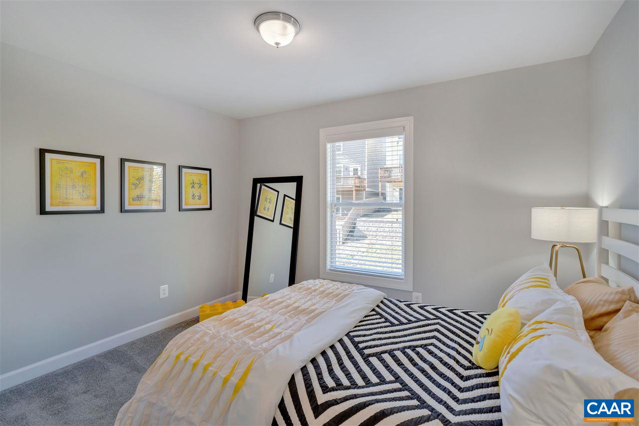 3134 Horizon Road Charlottesville, VA 22902 - Photo 16 of 21 a bedroom with a bed and a lamp