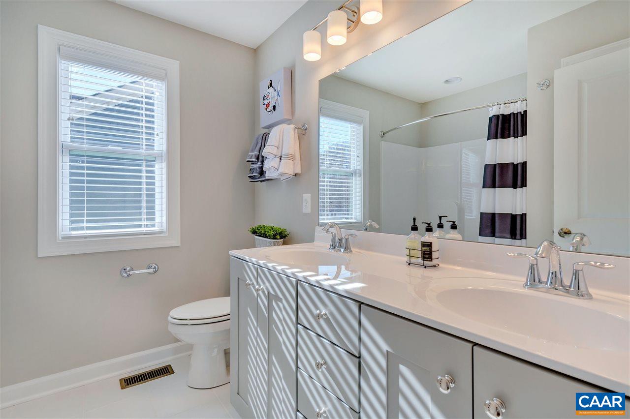 3134 Horizon Road Charlottesville, VA 22902 - Photo 18 of 21 a bathroom with a sink and a mirror