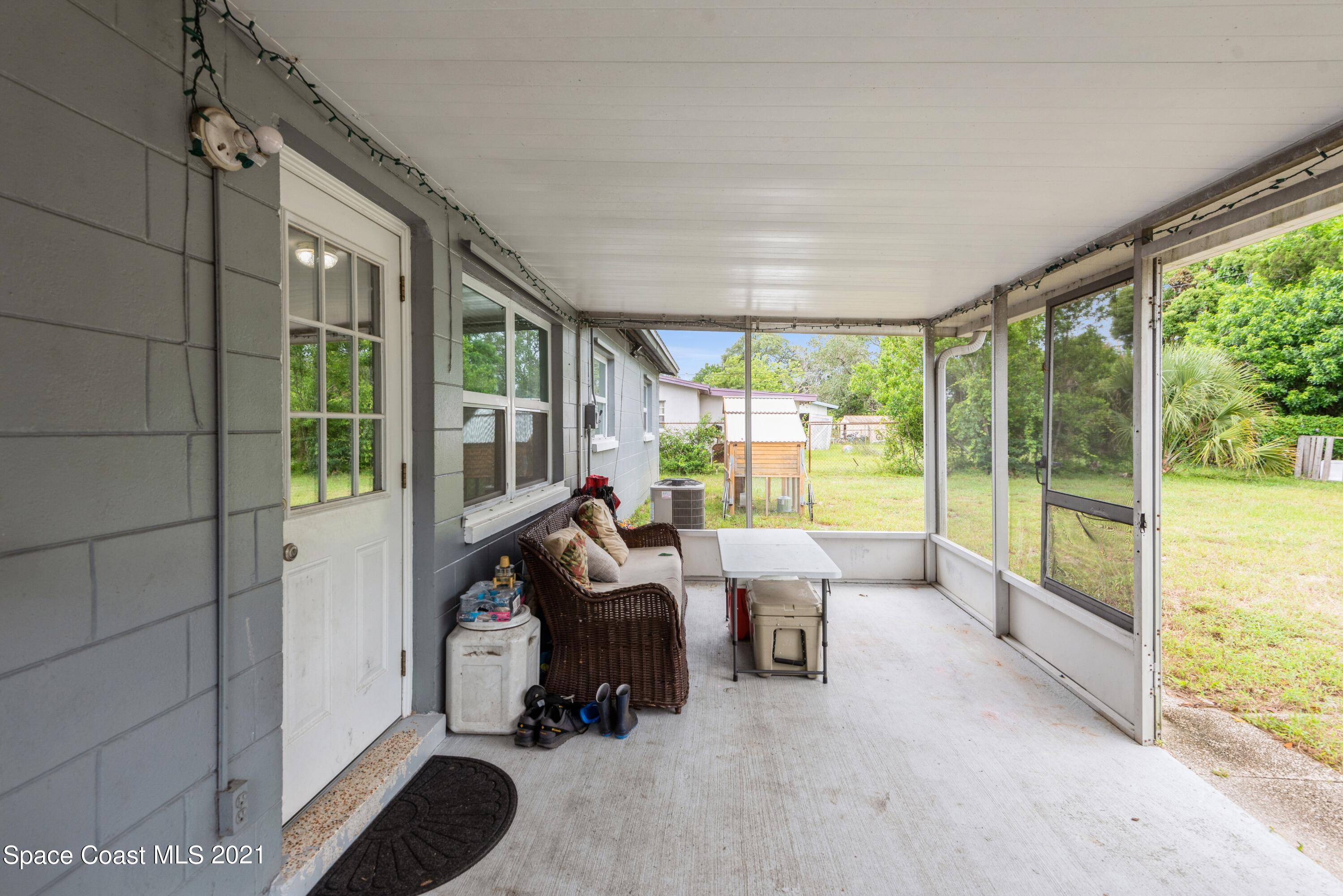2360 Dolphin Road Titusville, FL 32780 - Photo 24 of 29 Screened Porch