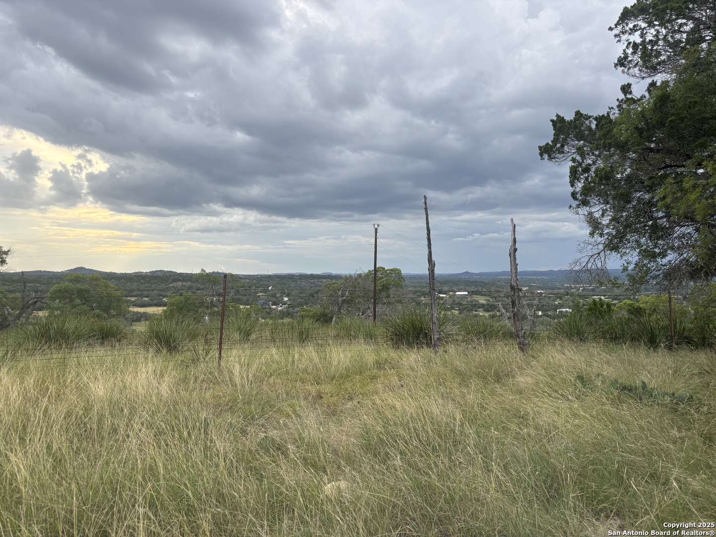 448 Waring Welfare Road Boerne, TX 78006 - Photo 12 of 14 a view of lake with mountain