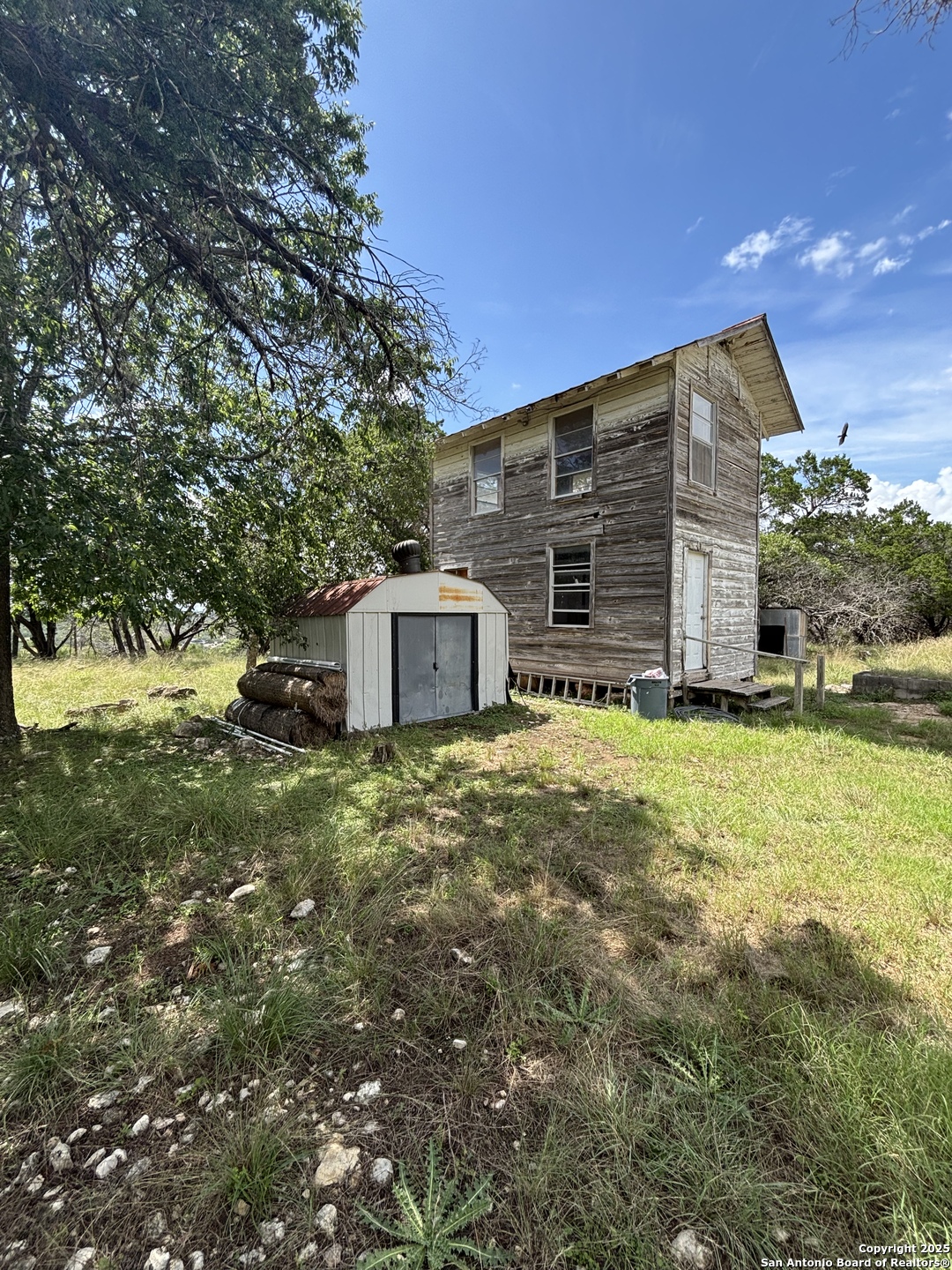 448 Waring Welfare Road Boerne, TX 78006 - Photo 7 of 14 a house view with a outdoor space