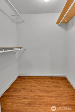 a view of an empty walk in closet