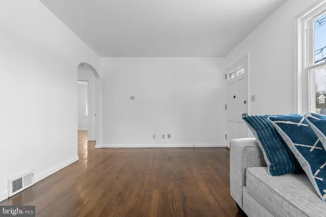 a kitchen with stainless steel appliances a stove a refrigerator and a sink