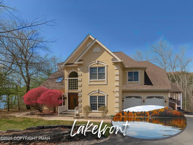 a living room with furniture a rug and a wooden floor
