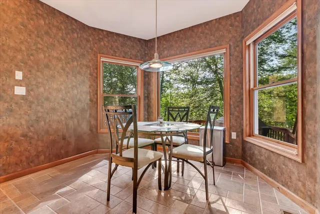 a backyard of a house with lots of green space