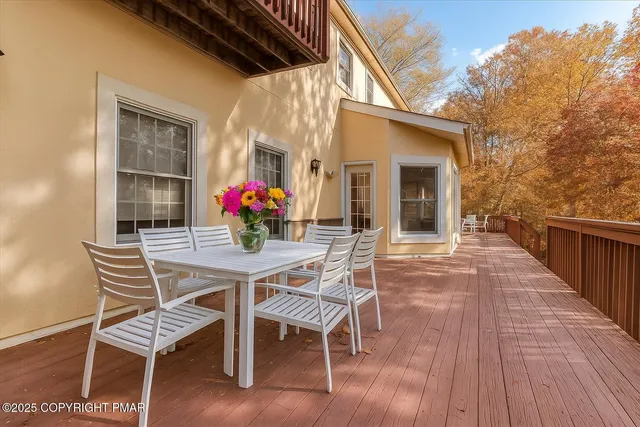 an aerial view of a house swimming pool and outdoor space