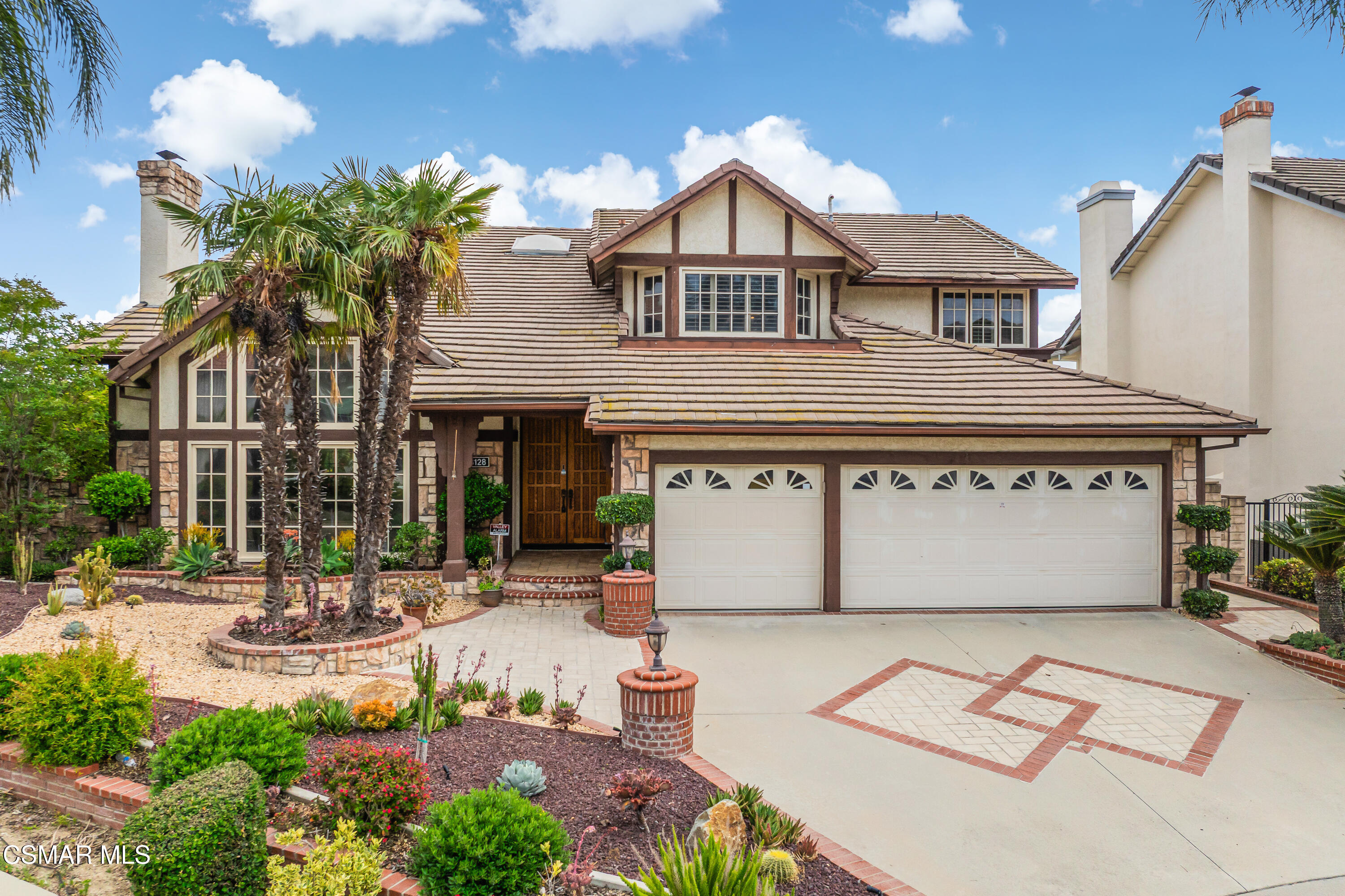 18128 Sandringham Court Porter Ranch, CA 91326 - Photo 1 of 60 Front